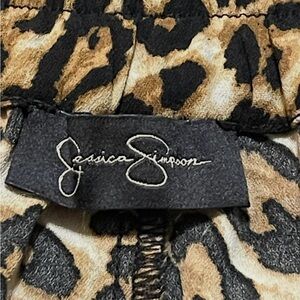 Jessica Simpson Leopard Print Pants Pull on pants with faux leather waistband.
